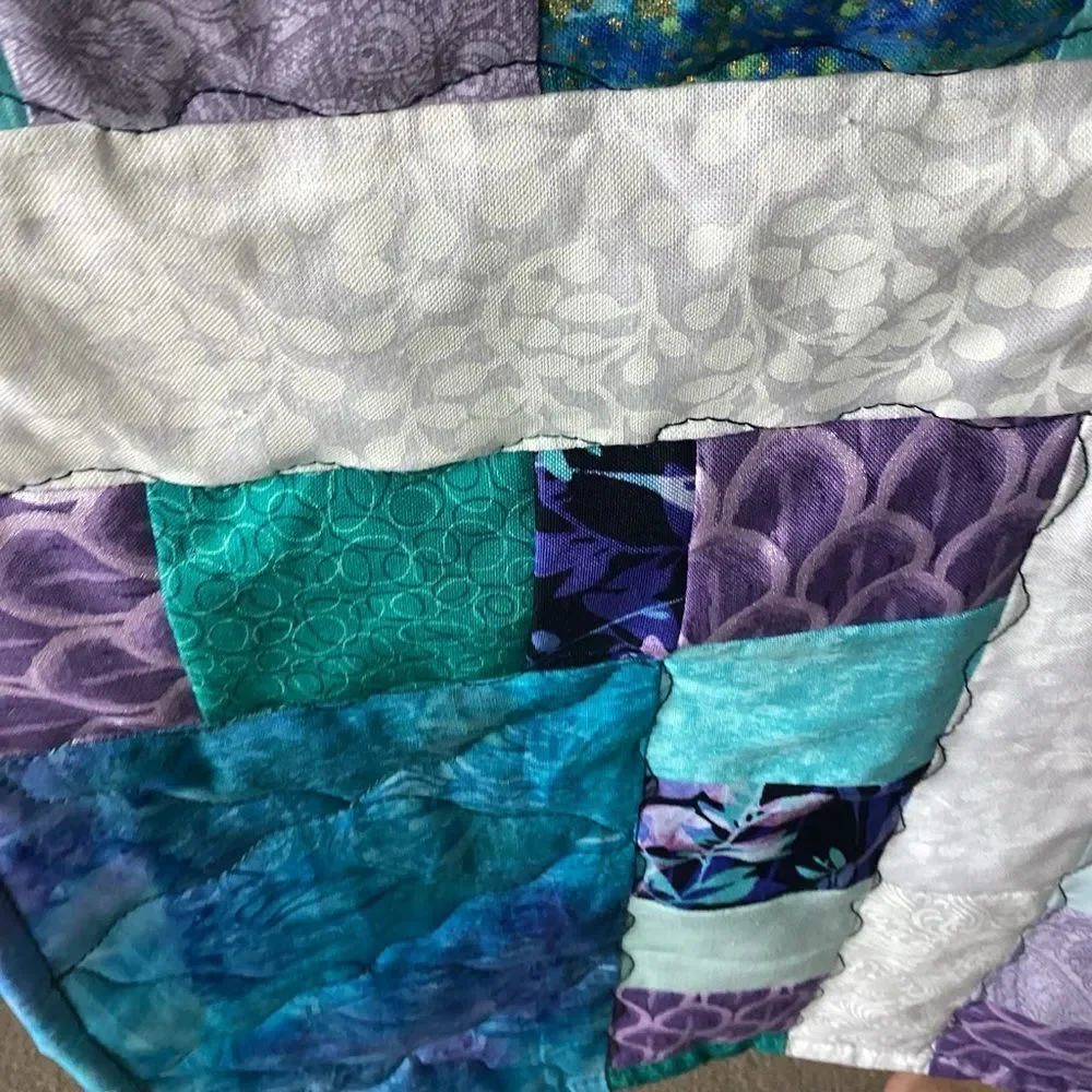 NWT. Hand Crafted Quilt of Blues, Purples and Turquoises